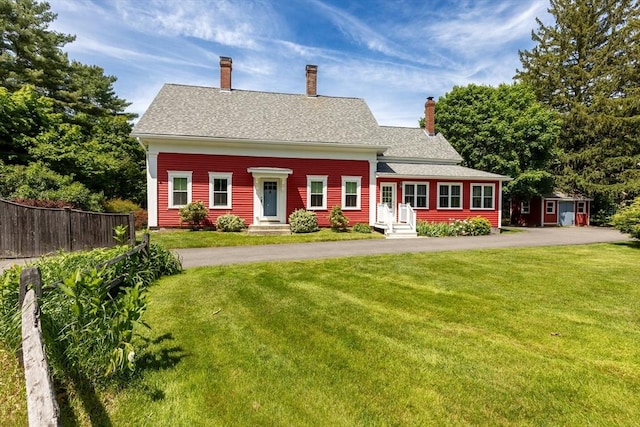 100 Gilbert St, Mansfield, MA 02048 - view of front of home with a chimney and entry steps