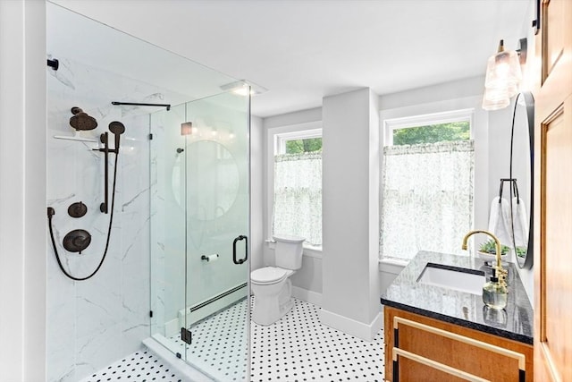 100 Gilbert St, Mansfield, MA 02048 - full bath featuring baseboard heating, a marble finish shower, vanity, toilet, and baseboards