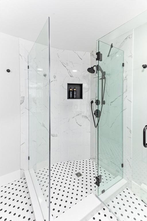 100 Gilbert St, Mansfield, MA 02048 - full bathroom featuring a marble finish shower