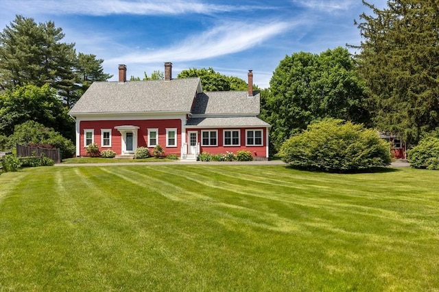 100 Gilbert St, Mansfield, MA 02048 - view of front of home with entry steps and a chimney