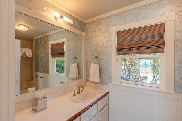 17 Mattarest Ln, Dartmouth, MA 02748 - full bath with a wainscoted wall, vanity, wallpapered walls, plenty of natural light, and crown molding