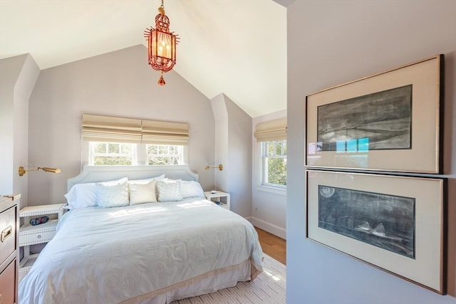 17 Mattarest Ln, Dartmouth, MA 02748 - bedroom with vaulted ceiling and wood finished floors