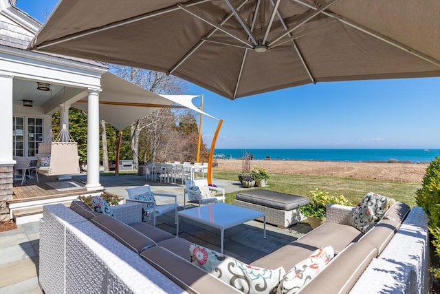 17 Mattarest Ln, Dartmouth, MA 02748 - view of patio / terrace with an outdoor hangout area, a water view, and outdoor dining space