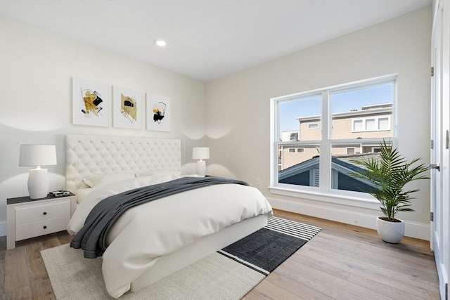 bedroom featuring light hardwood / wood-style flooring