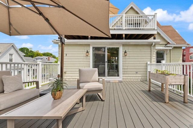 141 Jewett St Unit 2, Newton, MA 02458 - wooden deck featuring outdoor lounge area