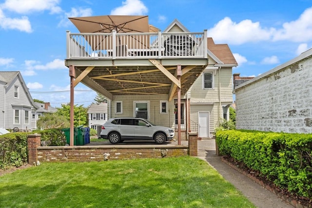 141 Jewett St Unit 2, Newton, MA 02458 - rear view of house featuring a lawn and a wooden deck
