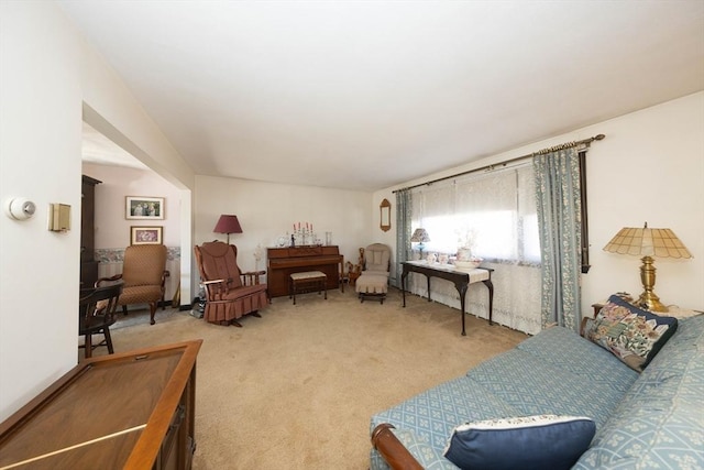 sitting room with light colored carpet