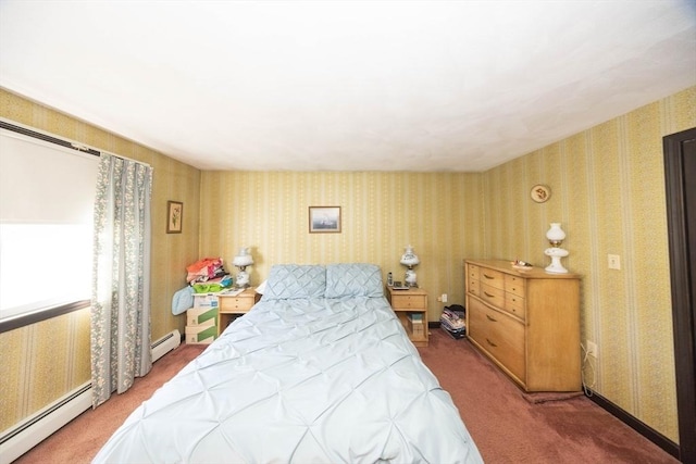 bedroom with a baseboard heating unit, carpet flooring, and wallpapered walls