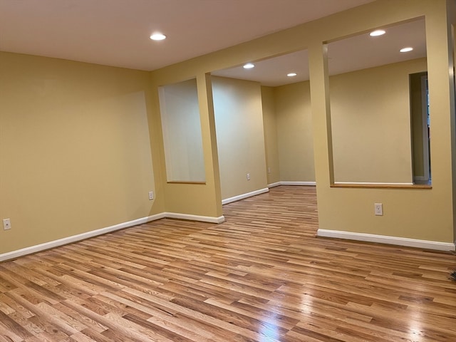 basement featuring light hardwood / wood-style floors