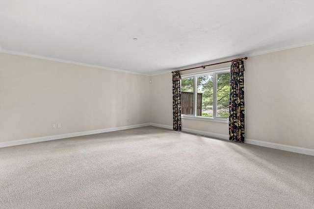 1205 Magnolia Dr Unit 1205, Wayland, MA 01778 - unfurnished room featuring ornamental molding, baseboards, and carpet