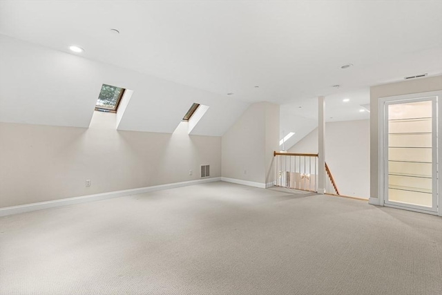 1205 Magnolia Dr Unit 1205, Wayland, MA 01778 - bonus room featuring a skylight, recessed lighting, light colored carpet, and baseboards