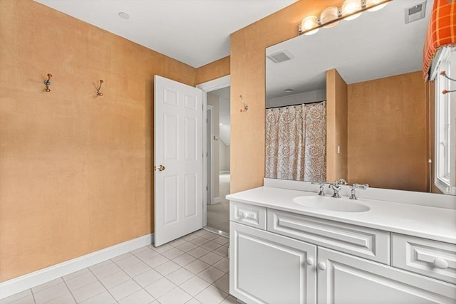 1205 Magnolia Dr Unit 1205, Wayland, MA 01778 - full bath featuring vanity, tile patterned flooring, and baseboards