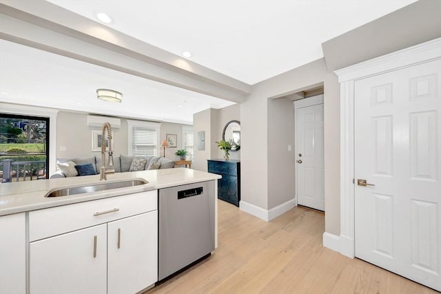 600 Shirley St Unit 3, Winthrop, MA 02152 - kitchen featuring dishwasher, a sink, open floor plan, light countertops, and recessed lighting