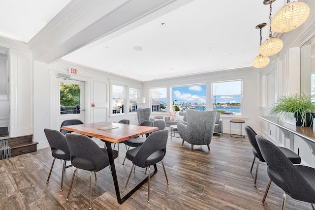 600 Shirley St Unit 3, Winthrop, MA 02152 - dining room featuring crown molding and wood finished floors