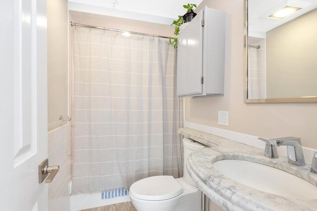 600 Shirley St Unit 3, Winthrop, MA 02152 - full bathroom with toilet, vanity, and curtained shower