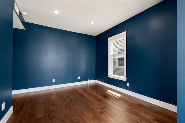 26 Newport St Unit 2, Boston, MA 02125 - empty room with dark wood-type flooring, baseboards, and recessed lighting