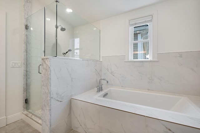 26 Newport St Unit 2, Boston, MA 02125 - bathroom featuring a stall shower, healthy amount of natural light, and a bath