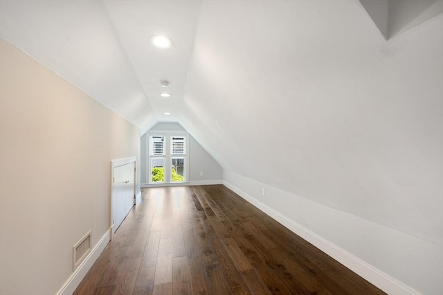 26 Newport St Unit 2, Boston, MA 02125 - bonus room featuring lofted ceiling, baseboards, dark wood-style flooring, and recessed lighting
