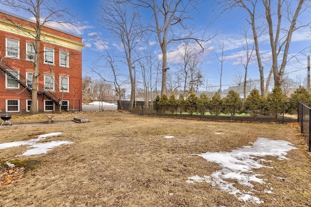 view of yard featuring fence