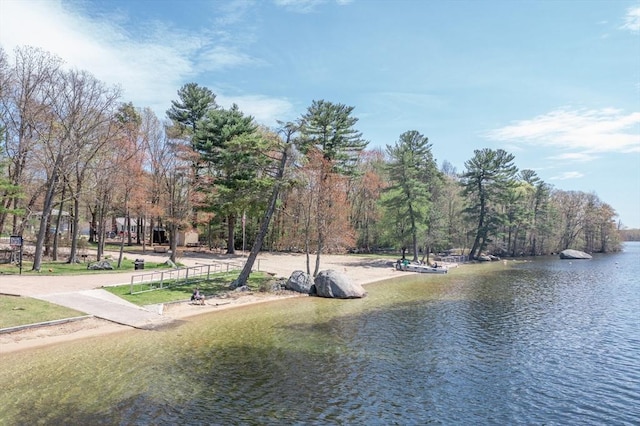 surrounding community with a water view