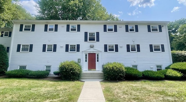 view of front facade with a front lawn