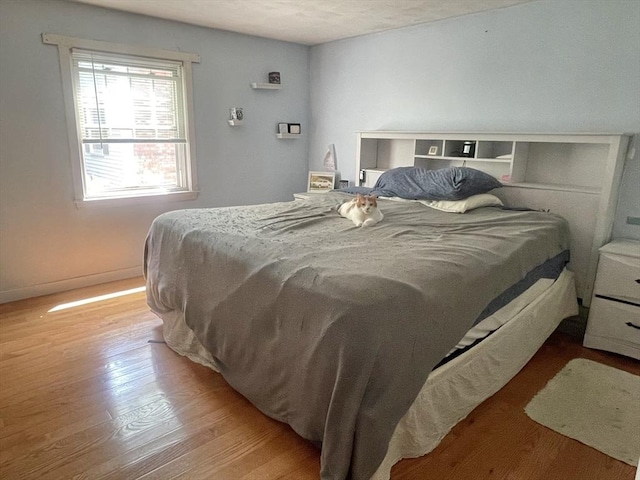 bedroom featuring light wood-type flooring