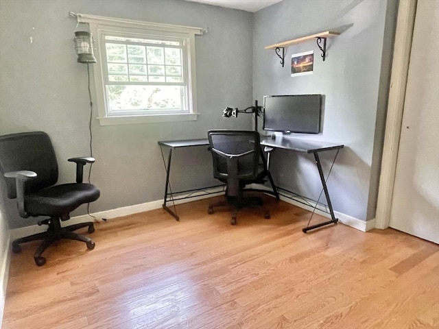 home office with light wood-type flooring