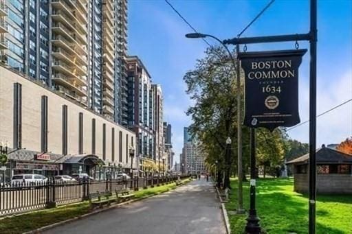 151 Tremont St Unit 9N, Boston, MA 02111 - view of street featuring street lights, a city view, and curbs
