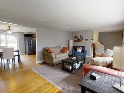15 Northside Ct, Haverhill, MA 01830 - living area featuring light wood-style floors and ceiling fan