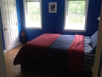 15 Northside Ct, Haverhill, MA 01830 - bedroom with multiple windows and wood finished floors