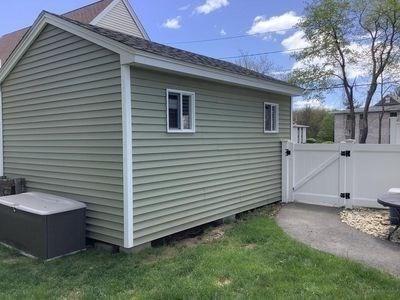 15 Northside Ct, Haverhill, MA 01830 - view of side of home featuring a gate