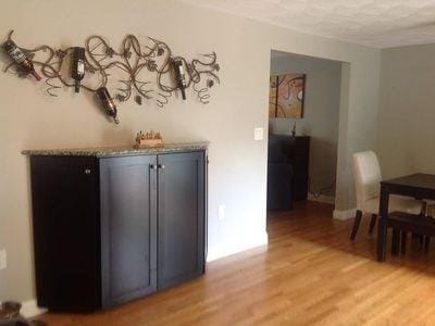 15 Northside Ct, Haverhill, MA 01830 - bar with light wood-style flooring
