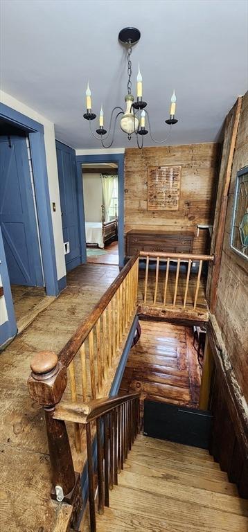 5 Putnam Hill Rd, Sutton, MA 01590 - stairs featuring wood-type flooring and a chandelier