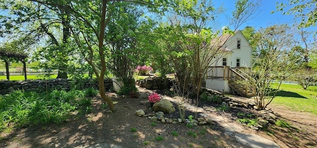 5 Putnam Hill Rd, Sutton, MA 01590 - view of yard featuring a wooden deck, fence, and stairs