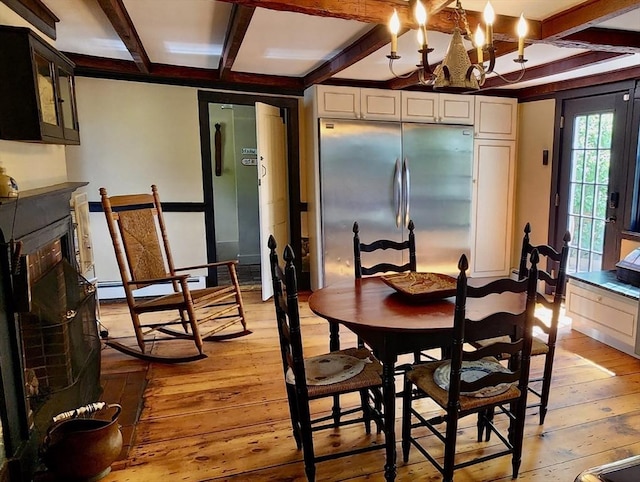 5 Putnam Hill Rd, Sutton, MA 01590 - dining room featuring coffered ceiling, light wood-style floors, beamed ceiling, a baseboard heating unit, and a chandelier