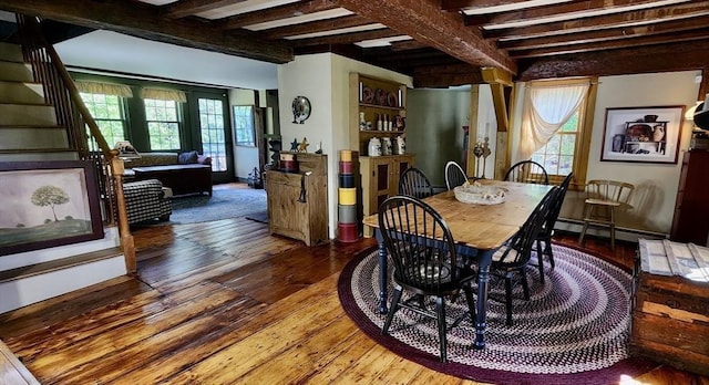 5 Putnam Hill Rd, Sutton, MA 01590 - dining room featuring a baseboard heating unit, wood-type flooring, beamed ceiling, and stairway