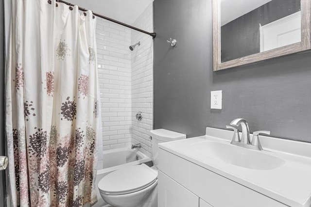 bathroom featuring vanity, toilet, and shower / bathtub combination with curtain