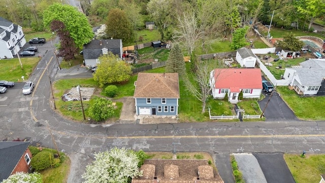 aerial view of property's location featuring nearby suburban area