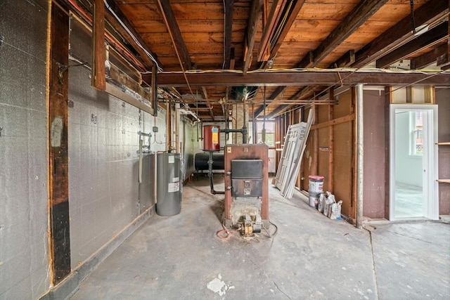 basement with water heater and heating fuel