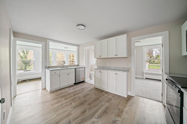 kitchen with stainless steel dishwasher, radiator heating unit, a sink, black / electric stove, and light wood-style flooring