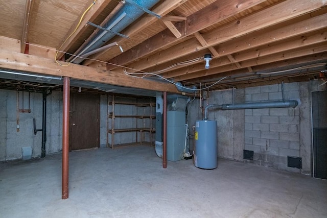 unfinished below grade area with water heater and heating unit