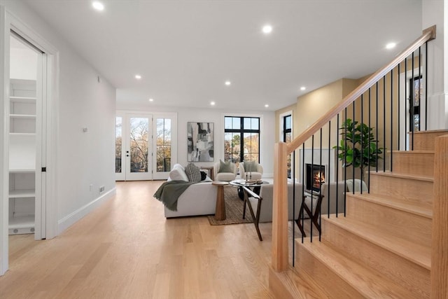 living room with light hardwood / wood-style flooring