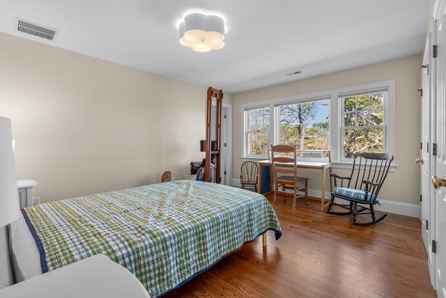 bedroom featuring wood-type flooring