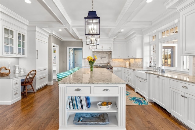 kitchen featuring white cabinetry, dark wood-type flooring, and coffered ceiling