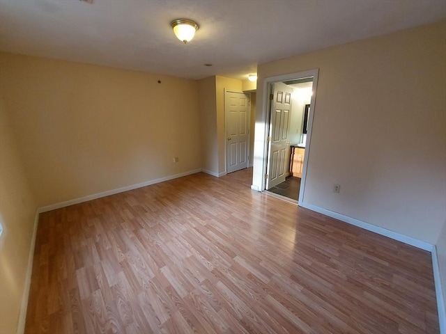 unfurnished room featuring light hardwood / wood-style floors