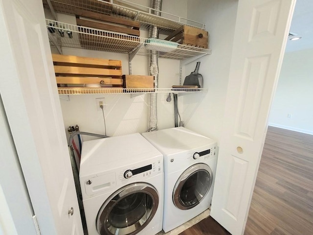 90 Quincy Shore Dr Unit 303, Quincy, MA 02171 - laundry room with dark wood-style floors and separate washer and dryer
