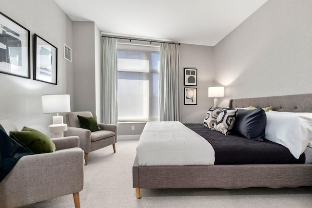 carpeted bedroom with visible vents