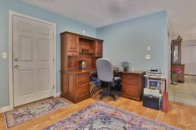 219-221 Wilson St Unit 1, Haverhill, MA 01832 - office area with light wood-style floors and baseboards