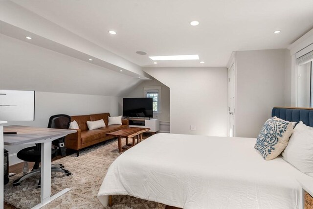 bedroom featuring recessed lighting and lofted ceiling