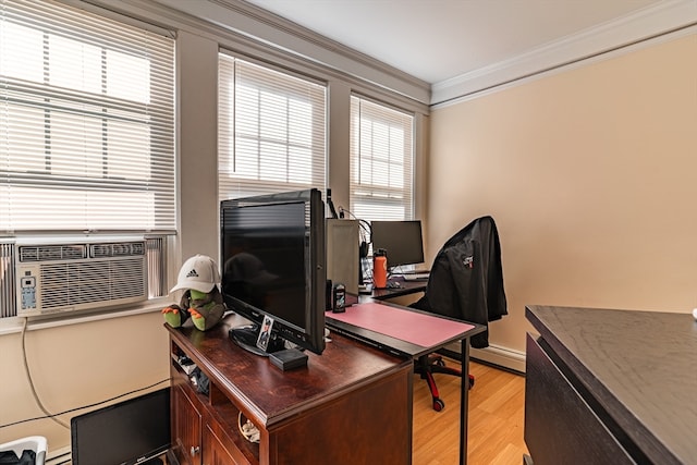 office with ornamental molding, cooling unit, and light wood-type flooring